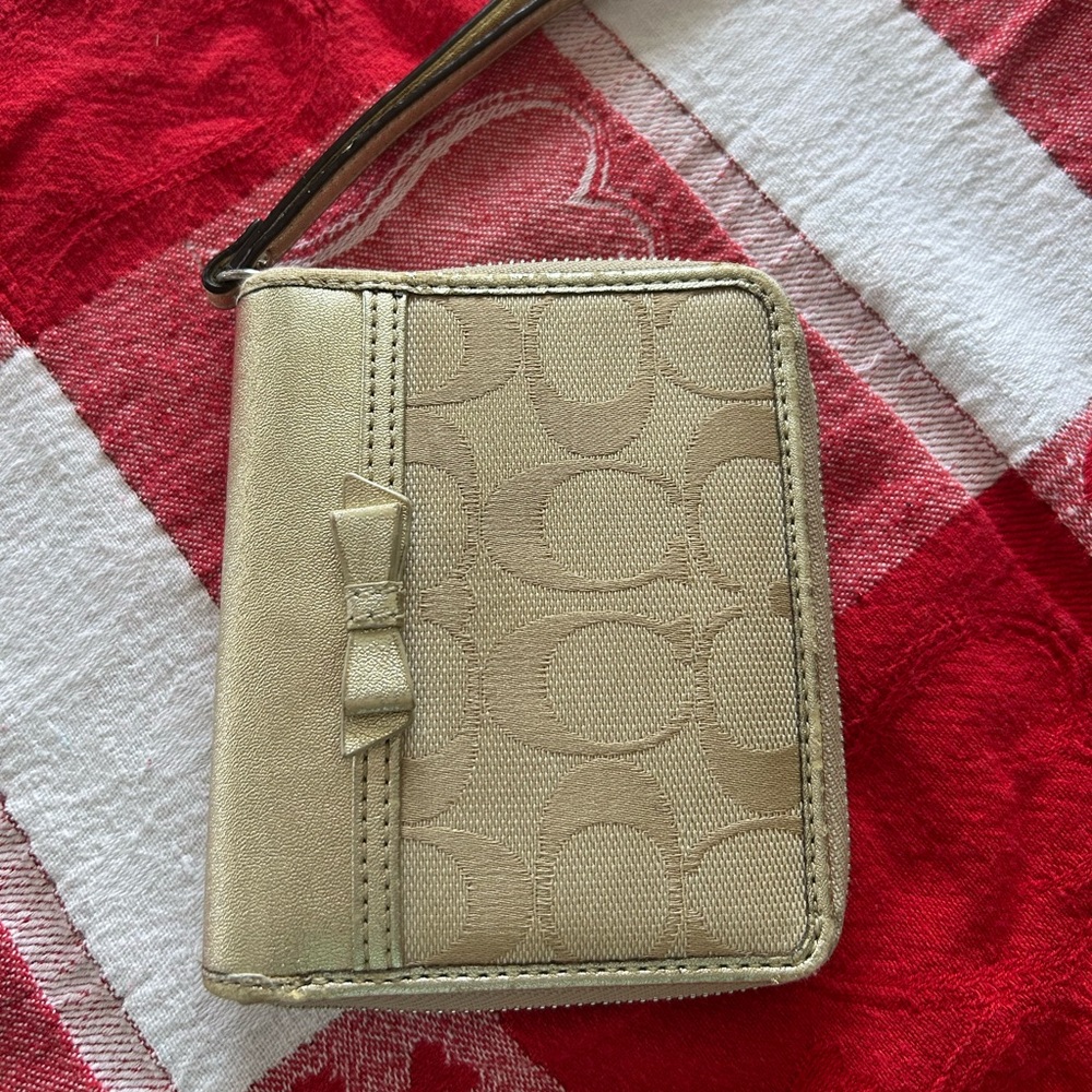 Coach Gold Wristlet Wallet with Bow Accent